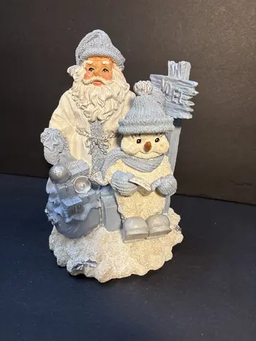 Santa with Powder and Sign