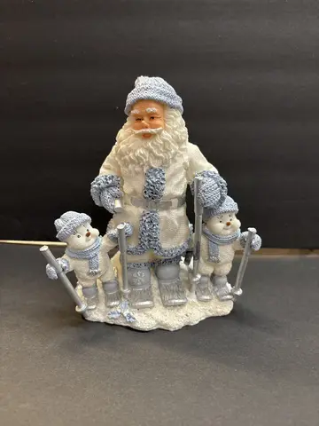 Santa and Two Buddies Skiing